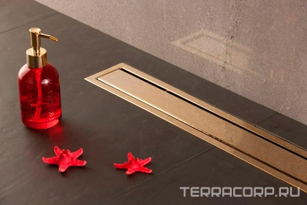 Дренажный канал 750хh71/117мм,готов компл,сифон d50 выход вбок 48л/мин,ножки, 2х сторон.решётка/полая под плитку(цв.золото 24К глянец)Prem Gold LineZZ Pestan Premium Gold Line 13100054